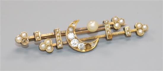 An early 20th century yellow metal, seed pearl and diamond set crescent & moon bar brooch, 45mm.